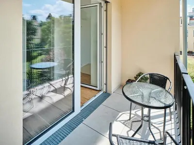Ein Balkon oder eine Terrasse in der Unterkunft Next to Schönbrunnpalace close to Public Transport - MySchönbrunn Apartments