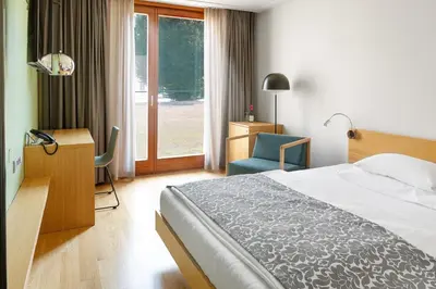 Ein Bett oder Betten in einem Zimmer der Unterkunft Hotel Schloss Hernstein