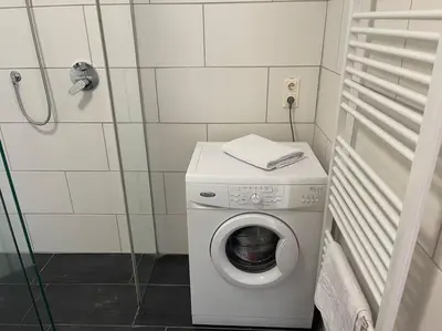 Ein Badezimmer in der Unterkunft Dachgeschoss für 4 mit Terrasse