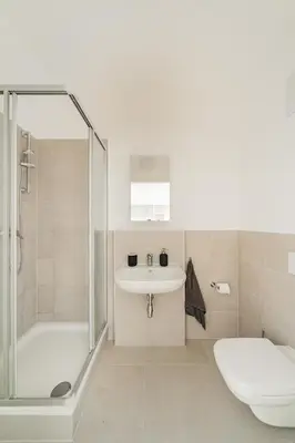 Ein Badezimmer in der Unterkunft Central City Suits