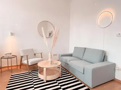 Ein Sitzbereich in der Unterkunft New City Apartment