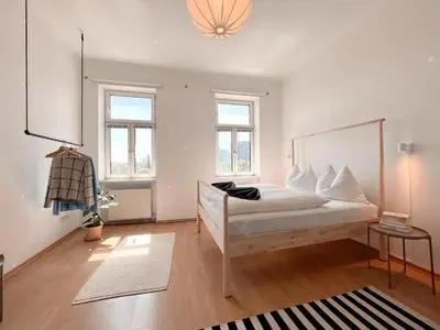 Ein Bett oder Betten in einem Zimmer der Unterkunft New City Apartment