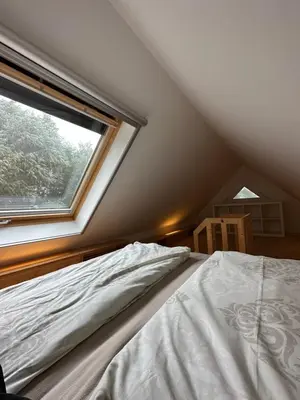 Ein Bett oder Betten in einem Zimmer der Unterkunft Haus am See