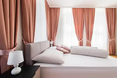 Ein Bett oder Betten in einem Zimmer der Unterkunft Royal Residences Vienna