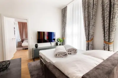 Ein Bett oder Betten in einem Zimmer der Unterkunft Royal Residences Vienna