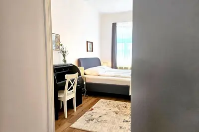 Ein Bett oder Betten in einem Zimmer der Unterkunft Vienna Palm Apartments