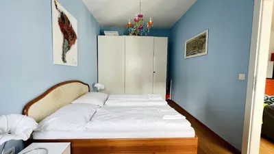 Ein Bett oder Betten in einem Zimmer der Unterkunft Cozy Retreat with Large Balcony near Schönbrunn