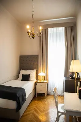 Ein Bett oder Betten in einem Zimmer der Unterkunft Boutique Hotel Nossek