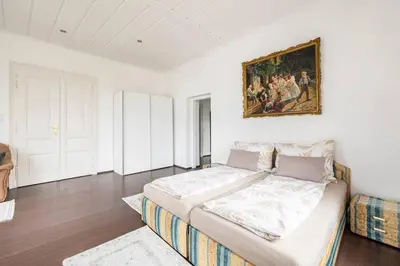 Ein Bett oder Betten in einem Zimmer der Unterkunft Charming spacious apartment