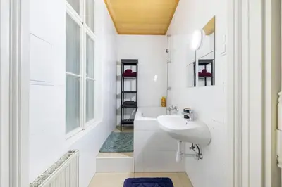 Ein Badezimmer in der Unterkunft Charming spacious apartment