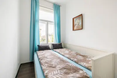 Ein Bett oder Betten in einem Zimmer der Unterkunft Charming spacious apartment