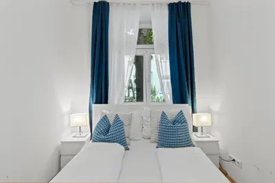 Ein Bett oder Betten in einem Zimmer der Unterkunft 1 Bedroom Garden Apartment near Schönbrunn
