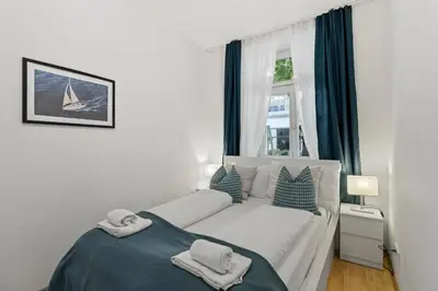 Ein Bett oder Betten in einem Zimmer der Unterkunft 1 Bedroom Garden Apartment near Schönbrunn