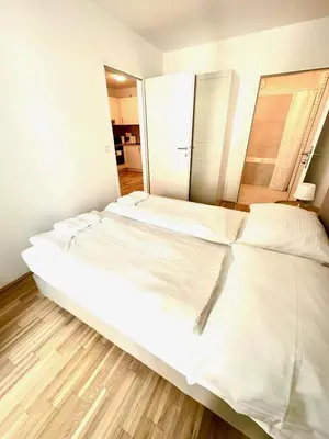 Ein Bett oder Betten in einem Zimmer der Unterkunft FORSTHAUS 30 FREE GARAGE