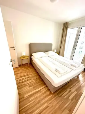 Ein Bett oder Betten in einem Zimmer der Unterkunft FORSTHAUS 30 FREE GARAGE