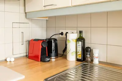 Küche/Küchenzeile in der Unterkunft Beautiful 1 Bedroom Apartment near Schönbrunn