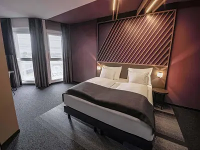 Ein Bett oder Betten in einem Zimmer der Unterkunft B&B HOTEL Wiener Neudorf