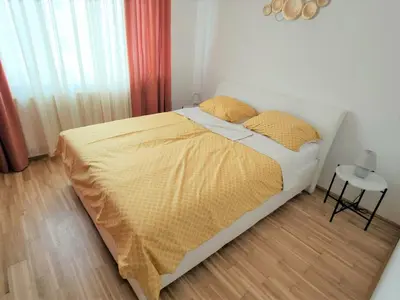 Ein Bett oder Betten in einem Zimmer der Unterkunft Apartment Elena inklusive Garagenplatz