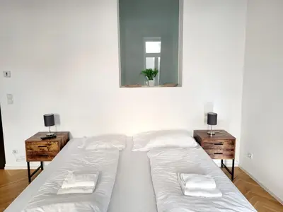 Ein Bett oder Betten in einem Zimmer der Unterkunft Neulerchenfelder Apartment Vienna