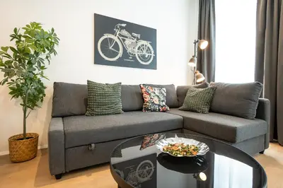 Ein Sitzbereich in der Unterkunft Posh studio with a king-size bed and modern design