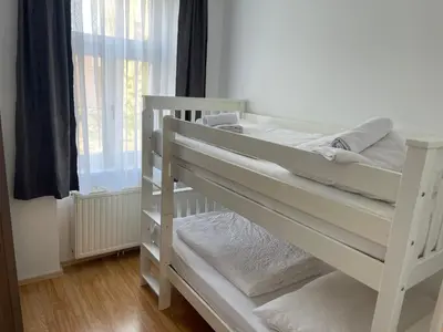 Ein Bett oder Betten in einem Zimmer der Unterkunft Peaceful Apartment for 4