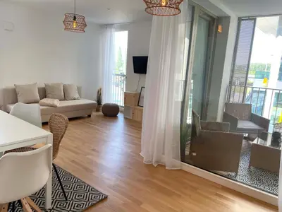 Ein Sitzbereich in der Unterkunft Urban Oasis: Stylische Wohnung
