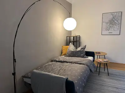 Ein Bett oder Betten in einem Zimmer der Unterkunft Apartment Wien West