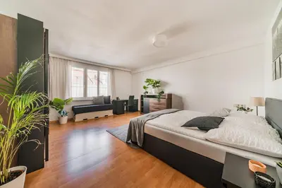 Ein Bett oder Betten in einem Zimmer der Unterkunft FeelHome-Karmeliterviertel-6 Gäste-WiFi-Smart TV