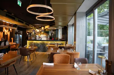 Ein Sitzbereich in der Unterkunft Primus Hotel & Apartments
