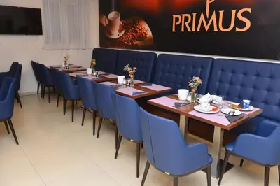 Ein Sitzbereich in der Unterkunft Primus Hotel & Apartments
