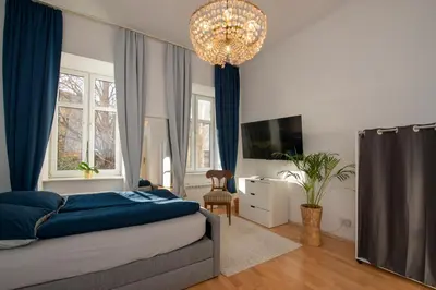 Ein Bett oder Betten in einem Zimmer der Unterkunft Home Suites Home