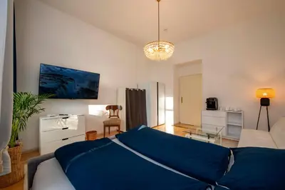 Ein Bett oder Betten in einem Zimmer der Unterkunft Home Suites Home