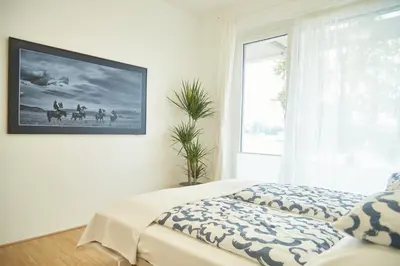 Ein Bett oder Betten in einem Zimmer der Unterkunft Danuberoom