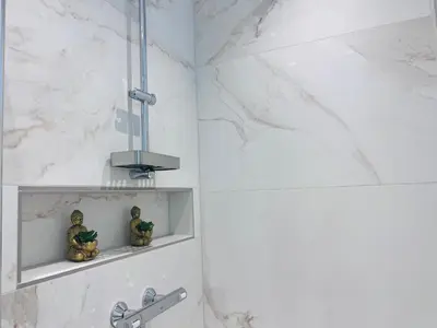 Ein Badezimmer in der Unterkunft Zeus Design Apartment Schlosspark Schönbrunn