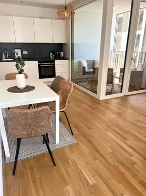 Küche/Küchenzeile in der Unterkunft Donaublick Oasis: Stylische Wohnung
