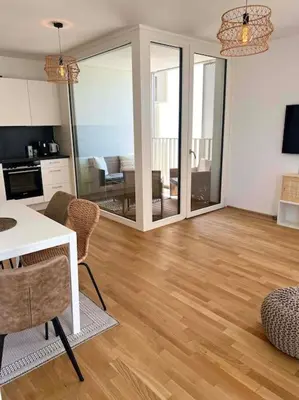 Küche/Küchenzeile in der Unterkunft Donaublick Oasis: Stylische Wohnung