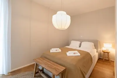 Ein Bett oder Betten in einem Zimmer der Unterkunft Vienna Heights Premium Apartments