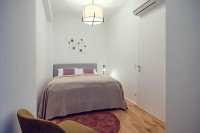 Ein Bett oder Betten in einem Zimmer der Unterkunft The 77 ALMA