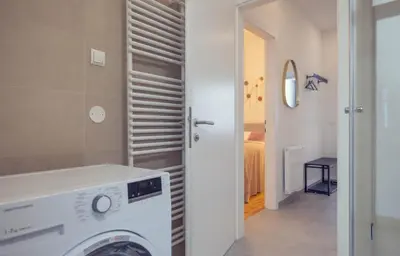 Ein Bett oder Betten in einem Zimmer der Unterkunft The 77 ALMA