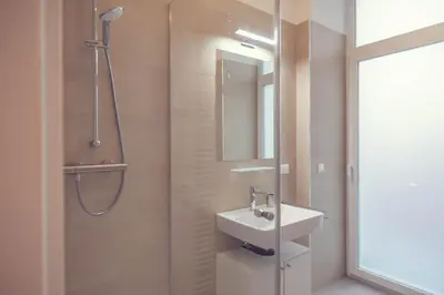 Ein Badezimmer in der Unterkunft The 77 ALMA