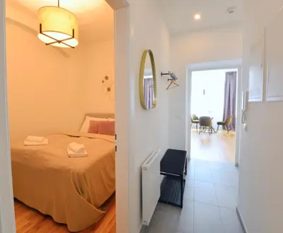 Ein Bett oder Betten in einem Zimmer der Unterkunft The 77 ALMA