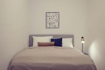 Ein Bett oder Betten in einem Zimmer der Unterkunft The 77 FRIEDA