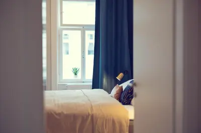 Ein Bett oder Betten in einem Zimmer der Unterkunft The 77 EMMA