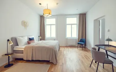 Ein Bett oder Betten in einem Zimmer der Unterkunft The 77 MARIE