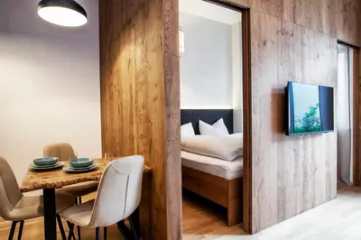 Ein Bett oder Betten in einem Zimmer der Unterkunft FERDI Margareten
