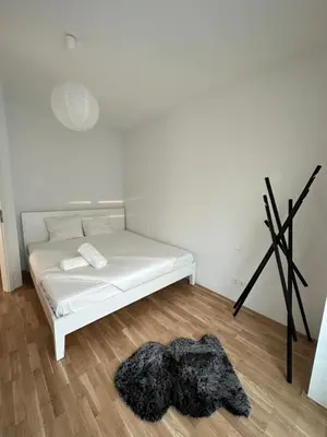 Ein Bett oder Betten in einem Zimmer der Unterkunft New Apartment with Spacious Balcony 18