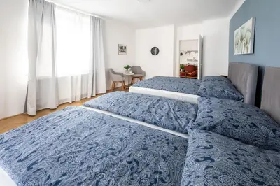 Ein Bett oder Betten in einem Zimmer der Unterkunft Family retreat on the Danube I 10 minute walk to city centre