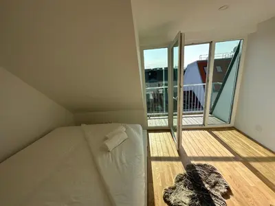 Ein Bett oder Betten in einem Zimmer der Unterkunft Contemporary Apartment with Stunning Views 20
