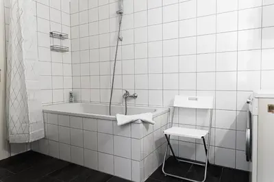 Ein Badezimmer in der Unterkunft Margarete Family Stay