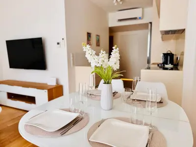 TV/Unterhaltungsangebot in der Unterkunft MOMENTIC Apartment - riverside